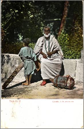 /images/imgs/africa/morocco/tangier-0011.jpg - Man and child with snake